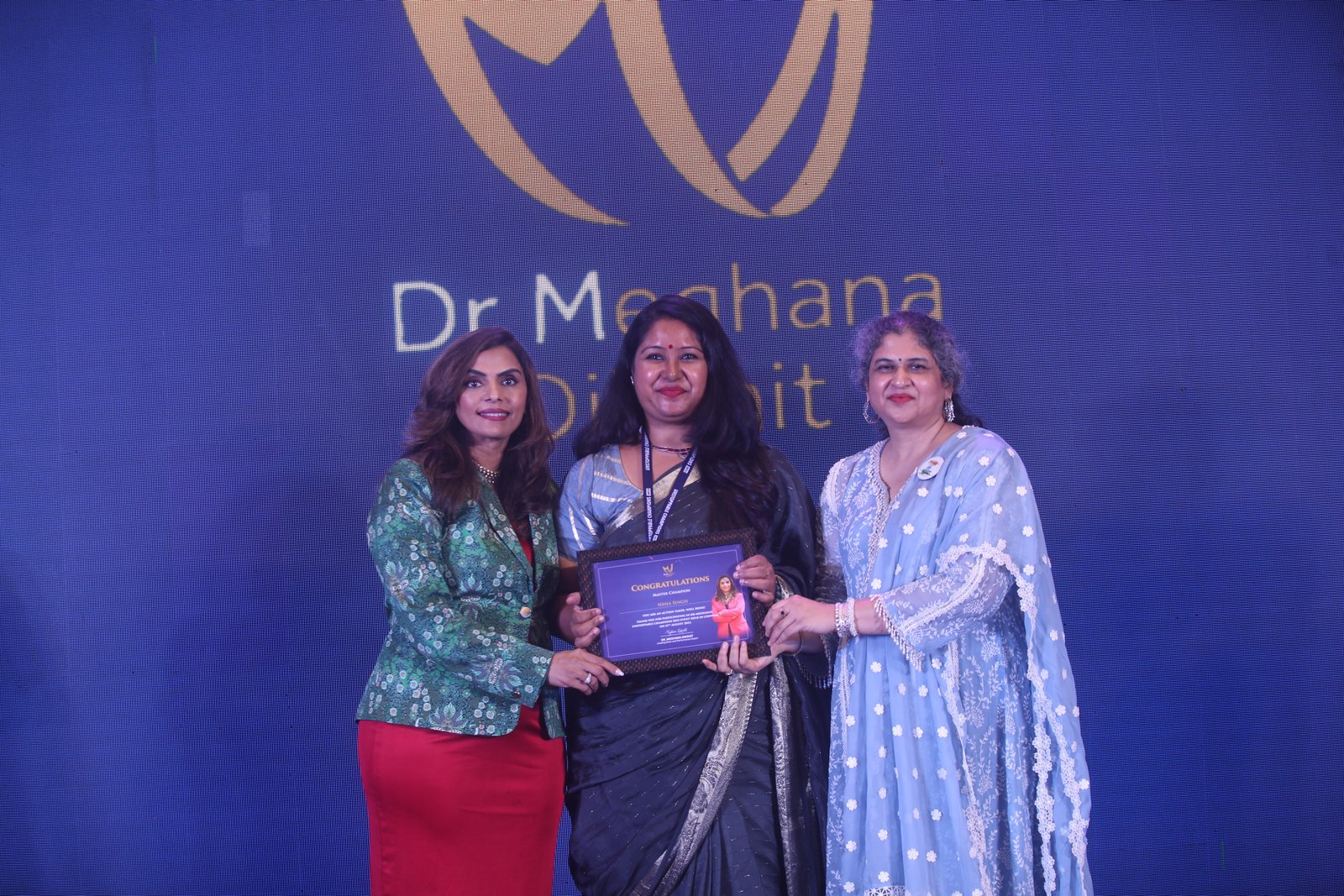 Neha at an award ceremony
