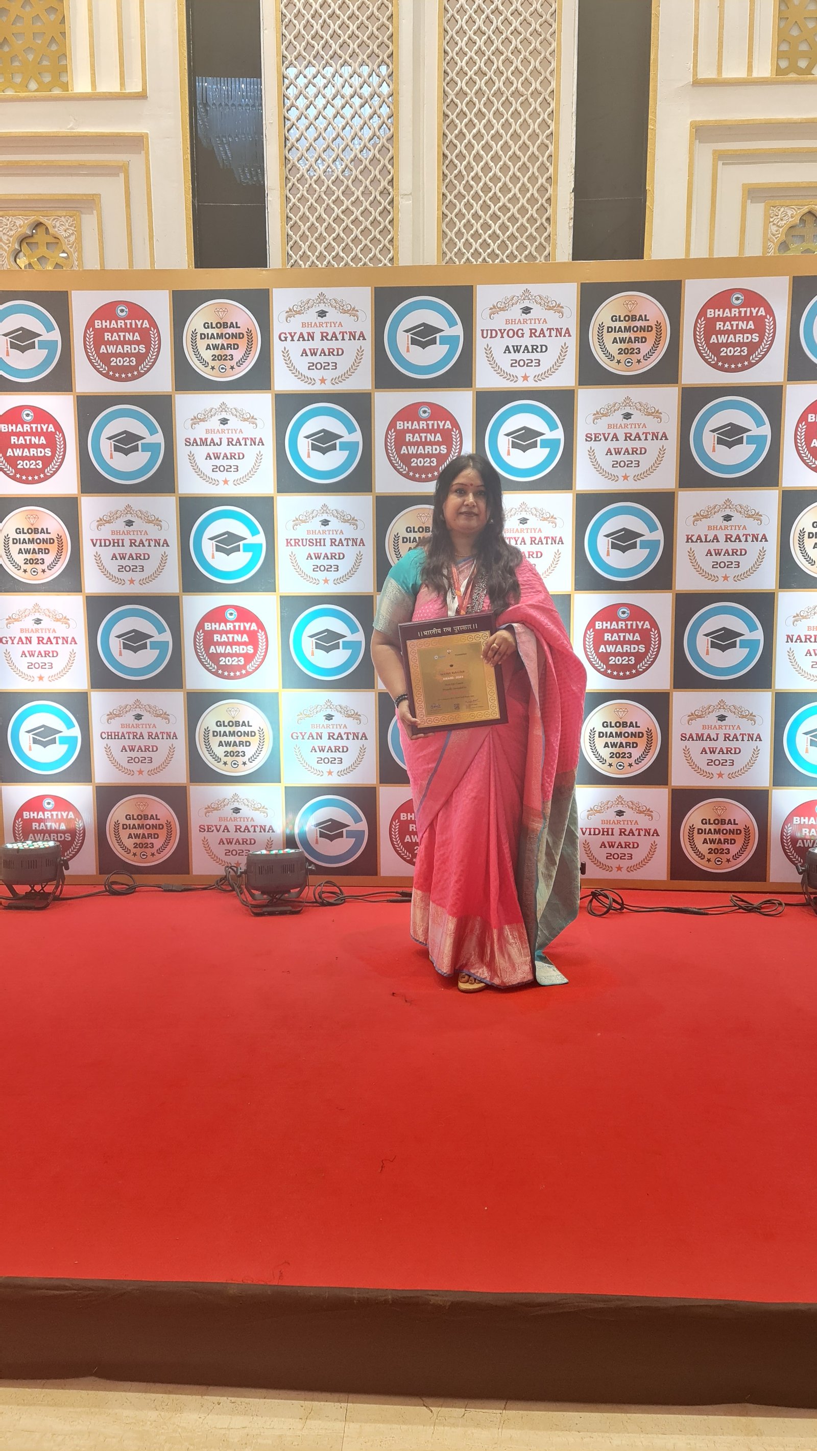 Neha with her Bhartiya Gyan Ratna Award 2023