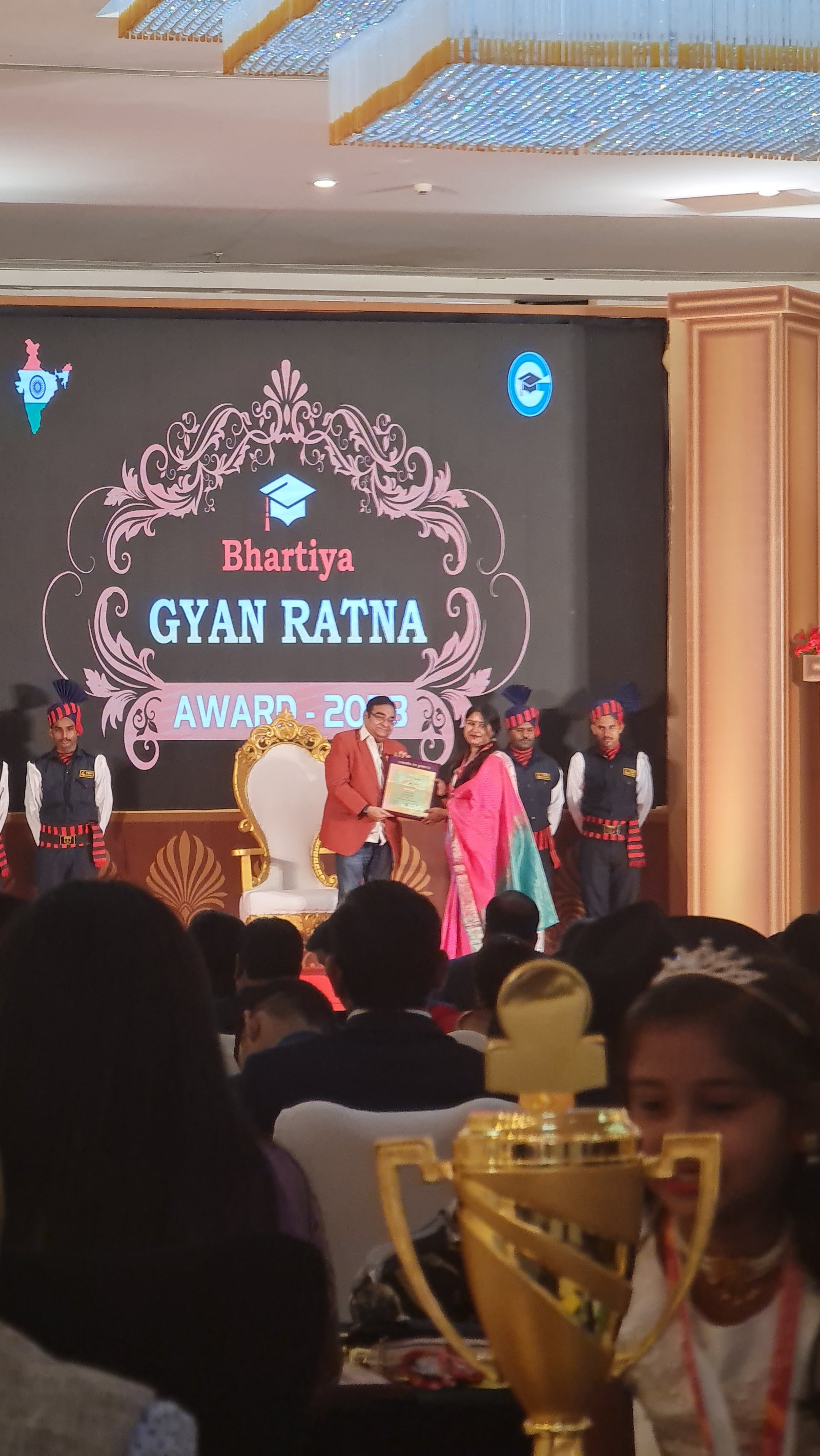 Neha receiving the Bhartiya Gyan Ratna Award 2023